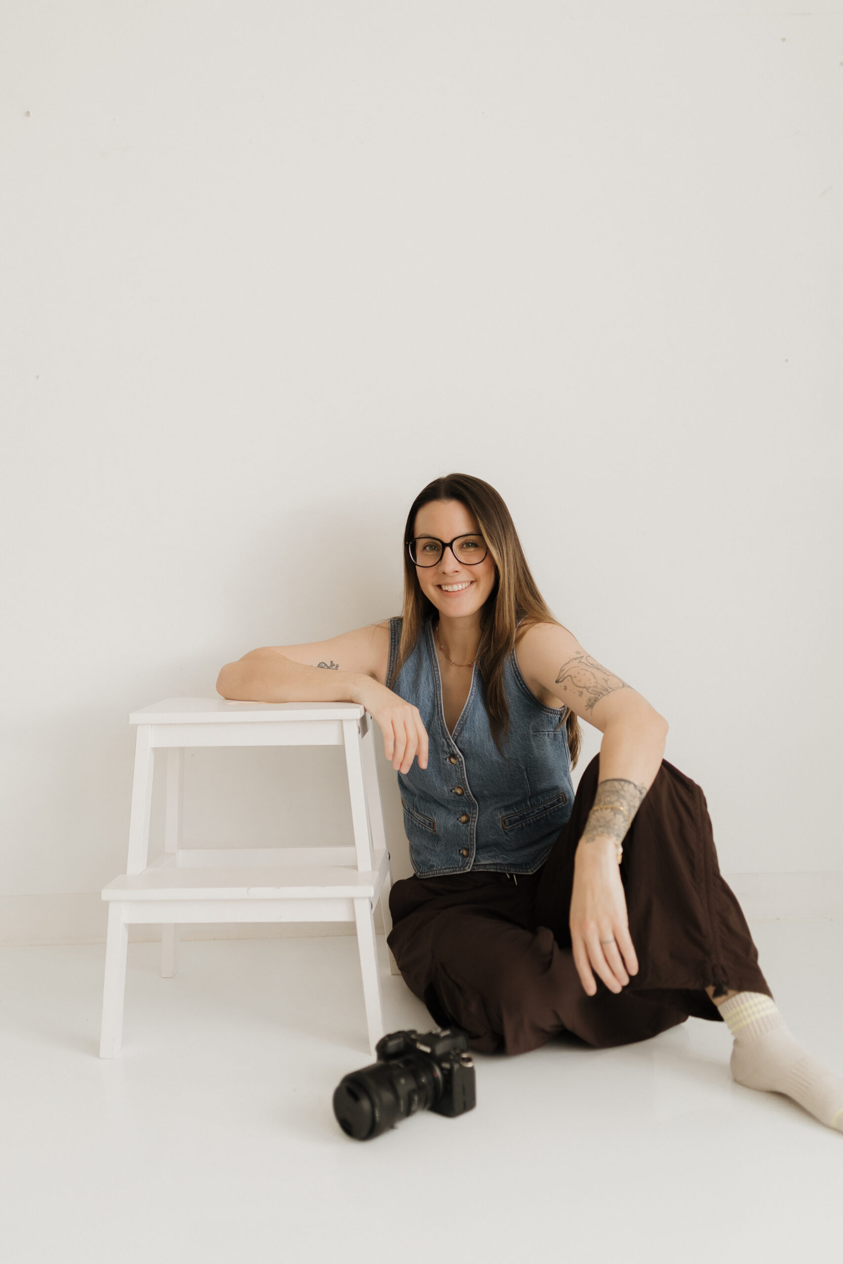 photo of a langley newborn photographer smiling at the camera